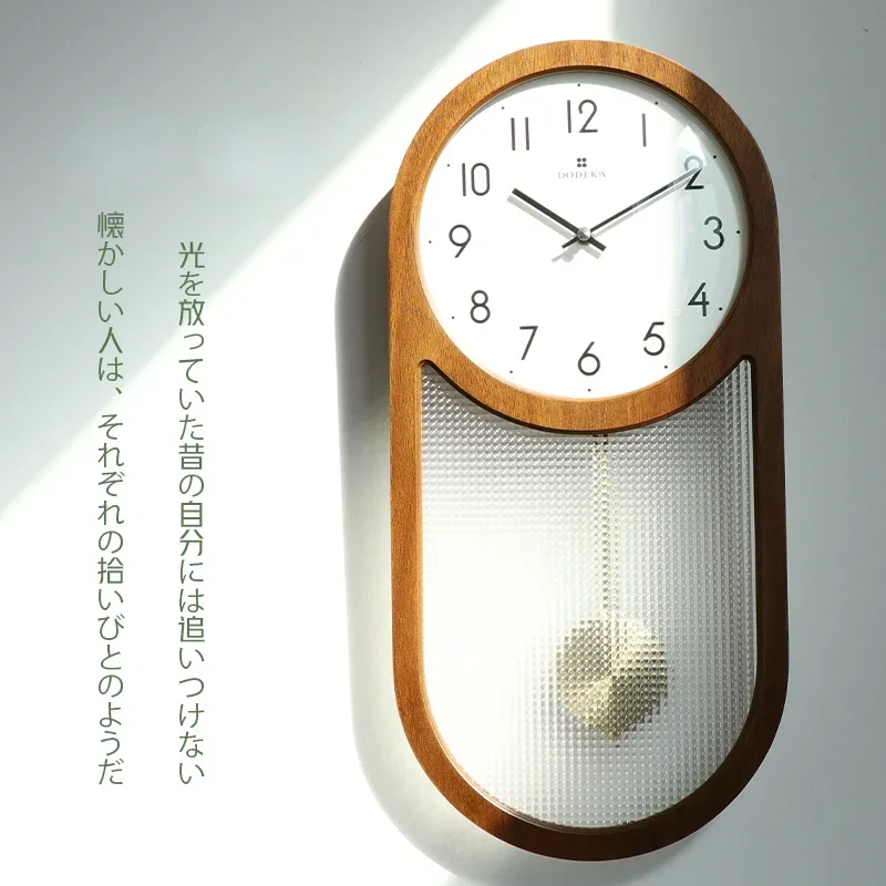 Japanese retro clock wall clock living room clock hanging wall atmosphere Chinese creative home decoration wooden pendulum clock 
Japanese retro clock wall clock living room clock hanging wall atmosphere Chinese creative home decoration wooden pendulum clock