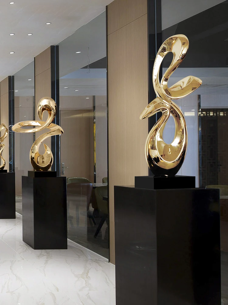 Light luxury sculpture decoration in the model room, soft decoration at the entrance, large abstract artwork, hotel club decorat
Light luxury sculpture decoration in the model room, soft decoration at the entrance, large abstract artwork, hotel club decorat
