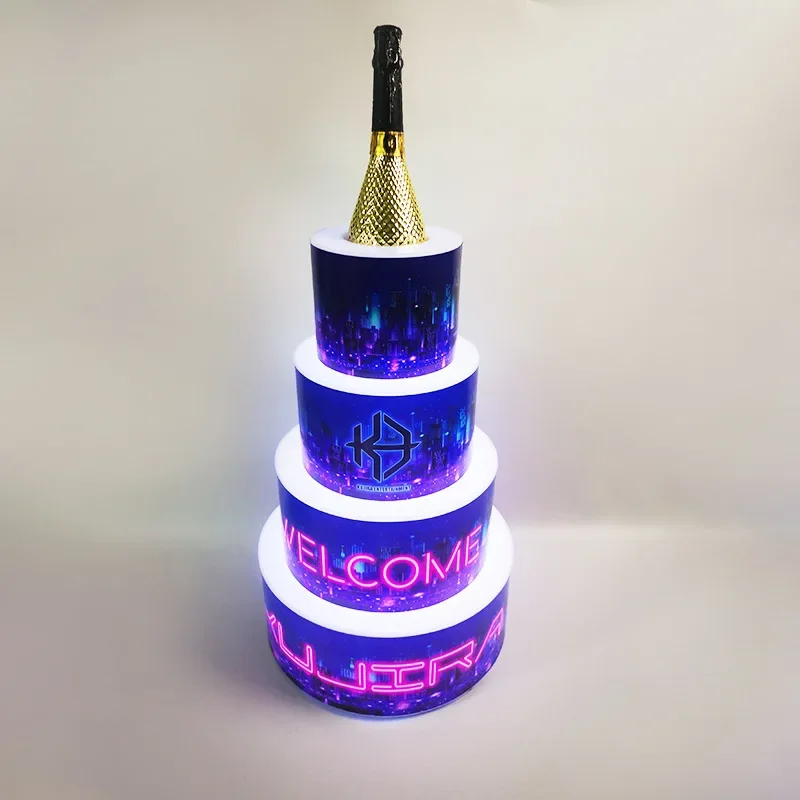 

champagne bottle service presenter delivery tray glowing colorful light cake-shape wine birthday bar