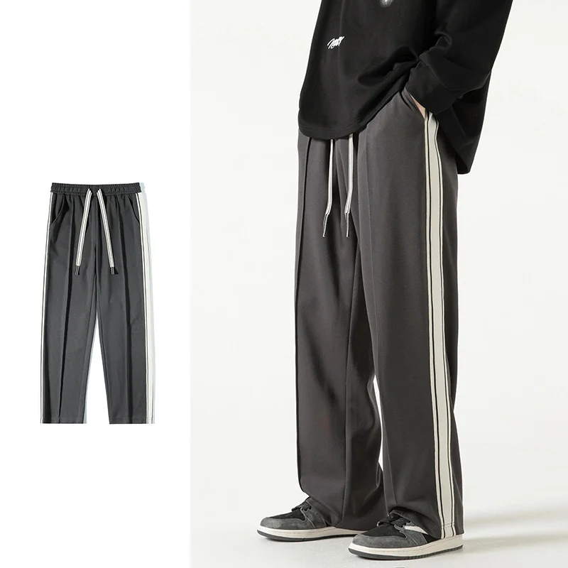

Spring and Autumn Men's Loose Spliced Stripes Korean Wide Leg Pants High Waist Elastic Fashion Casual Commuter Trousers