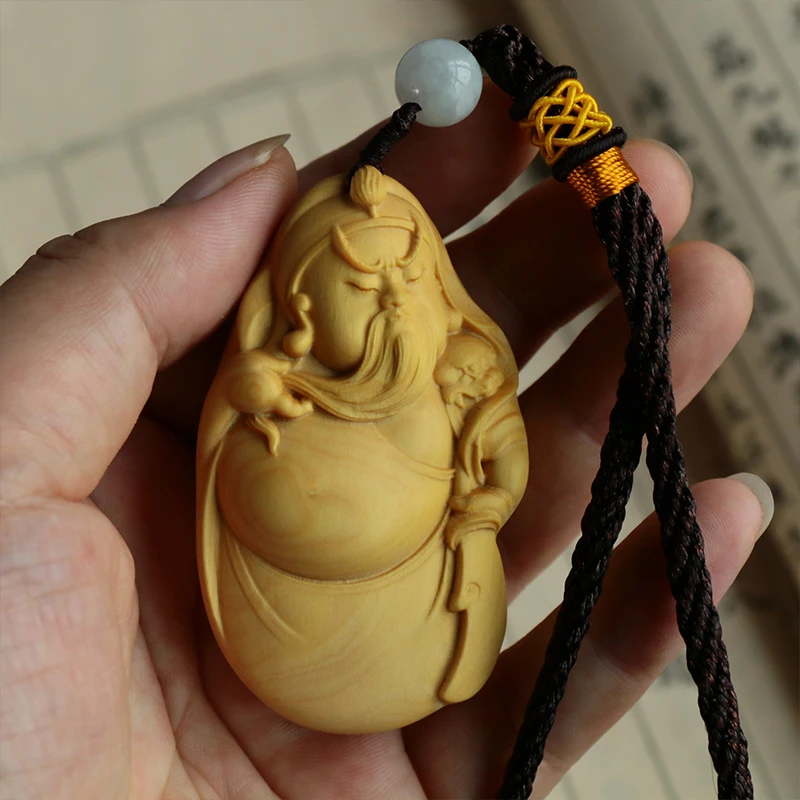 Guan Gong Pendant Masterpiece - Adorable Representation from Three Kingdoms Era: Boxwood Engraved Artistry, Distinct Solid Wood
Guan Gong Pendant Masterpiece - Adorable Representation from Three Kingdoms Era: Boxwood Engraved Artistry, Distinct Solid Wood