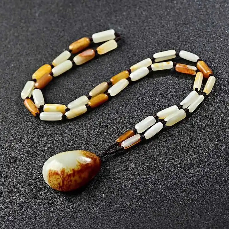 

Natural Hetian Pebble necklace rough stone white jade pendant suet red leather original seed