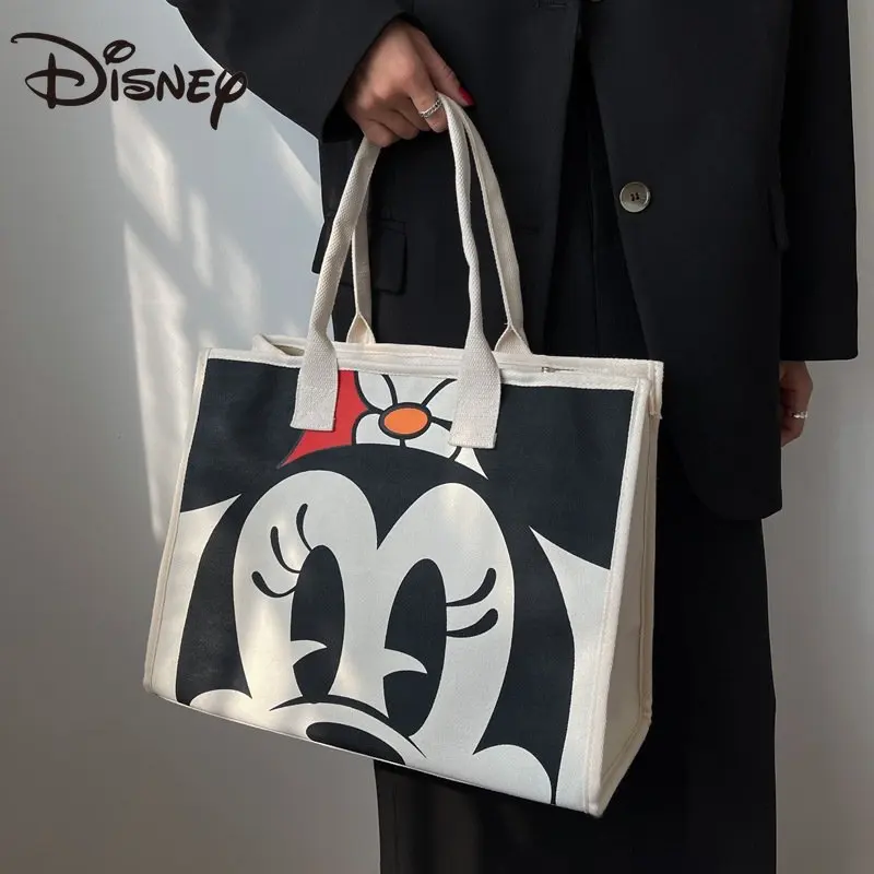 MINISO Women's Shoulder Bag 2022 New Mickey and Minnie Handy Shopping Bag Large Capacity Versatile Tote Bag Women Handbags 
MINISO Women's Shoulder Bag 2022 New Mickey and Minnie Handy Shopping Bag Large Capacity Versatile Tote Bag Women Handbags