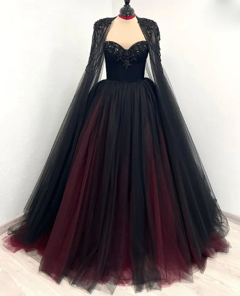 Gothic Black and Red Sweetheart Wedding Dresses with Cape Long Sleeve Sweetheart Beading Women Appliques Bridal Gown Court Train
Gothic Black and Red Sweetheart Wedding Dresses with Cape Long Sleeve Sweetheart Beading Women Appliques Bridal Gown Court Train