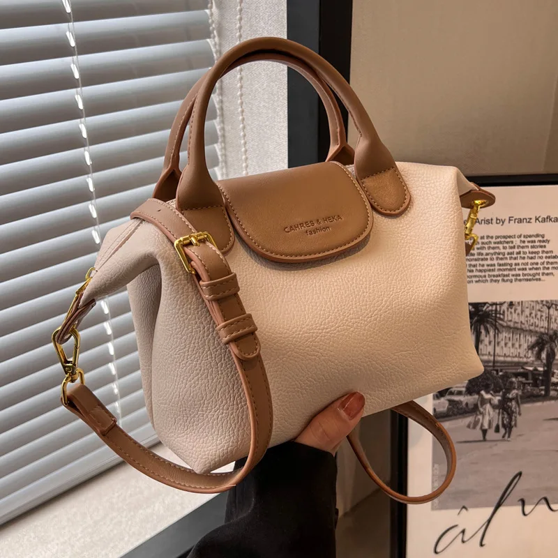 Europe and the United States new fashion simple popular cross-body bag women's hand shoulder bucket bag
Europe and the United States new fashion simple popular cross-body bag women's hand shoulder bucket bag