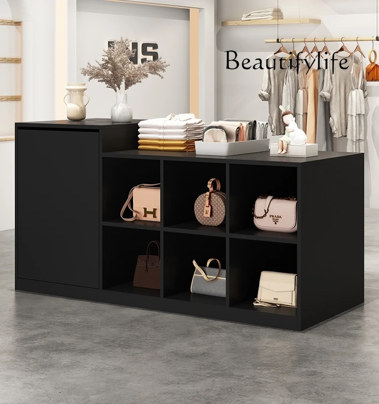 Магазин одежды чжундао, водный стол, простой современный стиль, двухсторонний дисплей, стол кассира
Магазин одежды чжундао, водный стол, простой современный стиль, двухсторонний дисплей, стол кассира