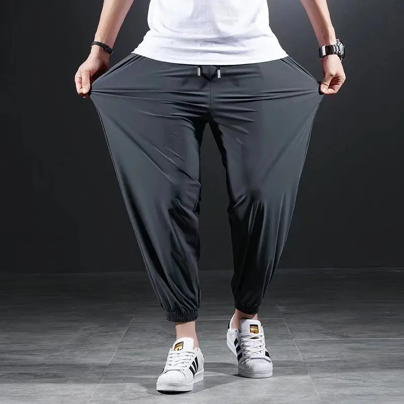 Summer Quick-drying Ice Silk Casual Pants Men's Ultra-thin Elastic Nine-point Pants Loose Drape Solid Beam Feet Pants
Summer Quick-drying Ice Silk Casual Pants Men's Ultra-thin Elastic Nine-point Pants Loose Drape Solid Beam Feet Pants