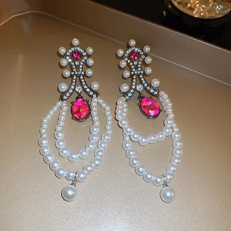 Модные Роскошные серьги-подвески с жемчугом и цирконом
Модные Роскошные серьги-подвески с жемчугом и цирконом