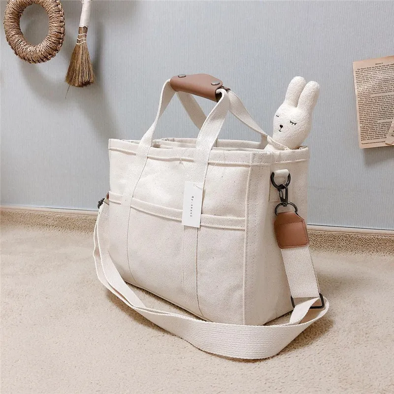ZK50 Baby Diaper Bag Multifunctional Large Capacity Mom Tote Bag Baby Stroller Canvas Storage Bag Hanging Bag
ZK50 Baby Diaper Bag Multifunctional Large Capacity Mom Tote Bag Baby Stroller Canvas Storage Bag Hanging Bag