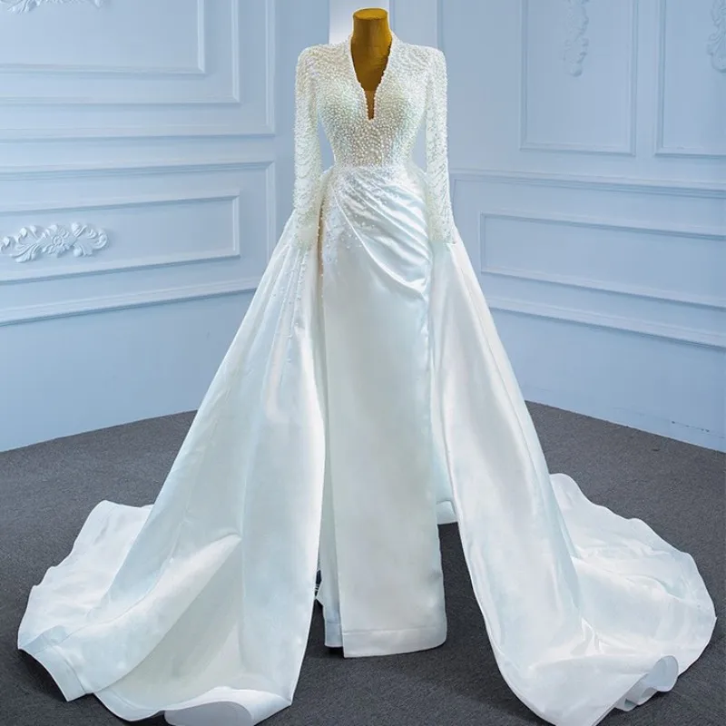 Luxury White Detachable Train Beads Mermaid Wedding Dress Sexy V-Neck Pearl Long Sleeved Trumpet Bridal Gown
Luxury White Detachable Train Beads Mermaid Wedding Dress Sexy V-Neck Pearl Long Sleeved Trumpet Bridal Gown