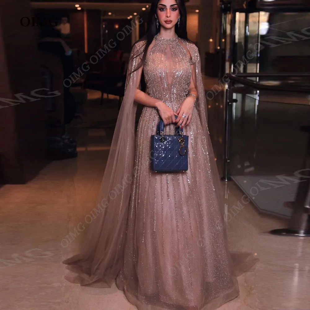 Шикарные платья OIMG с высоким воротом и блестками, выпускные платья, тюлевые длинные трапециевидные элегантные вечерние платья, женские платья Ro
Шикарные платья OIMG с высоким воротом и блестками, выпускные платья, тюлевые длинные трапециевидные элегантные вечерние платья, женские платья Ro