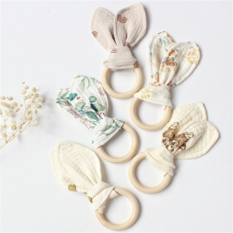 

Cute Cotton Rabbit Ears Baby Teether Newborn Wooden Teething Ring Hand Grasp Toy Safe Organic Bracelet Rattle Sensory Toy