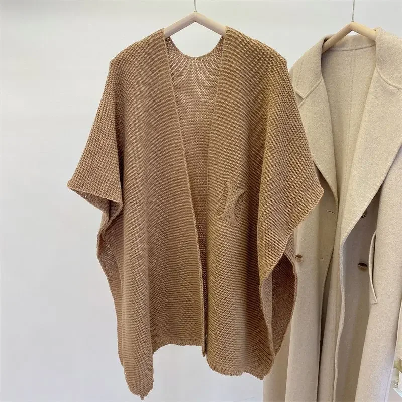 2023 Elegant Solid Cape Shawls for Women Autumn Winter Loose Knitted Poncho Open Stitch Sweater Cloak Bohemian Knitwear T265
2023 Elegant Solid Cape Shawls for Women Autumn Winter Loose Knitted Poncho Open Stitch Sweater Cloak Bohemian Knitwear T265