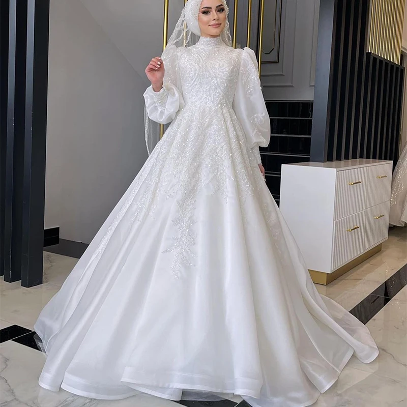 Glitter Muslim Wedding Dresses for Bride 2024 High Neck Long Latern Sleeve Sweep Train Beading Sequined Hijab Women Bridal Gowns
Glitter Muslim Wedding Dresses for Bride 2024 High Neck Long Latern Sleeve Sweep Train Beading Sequined Hijab Women Bridal Gowns
