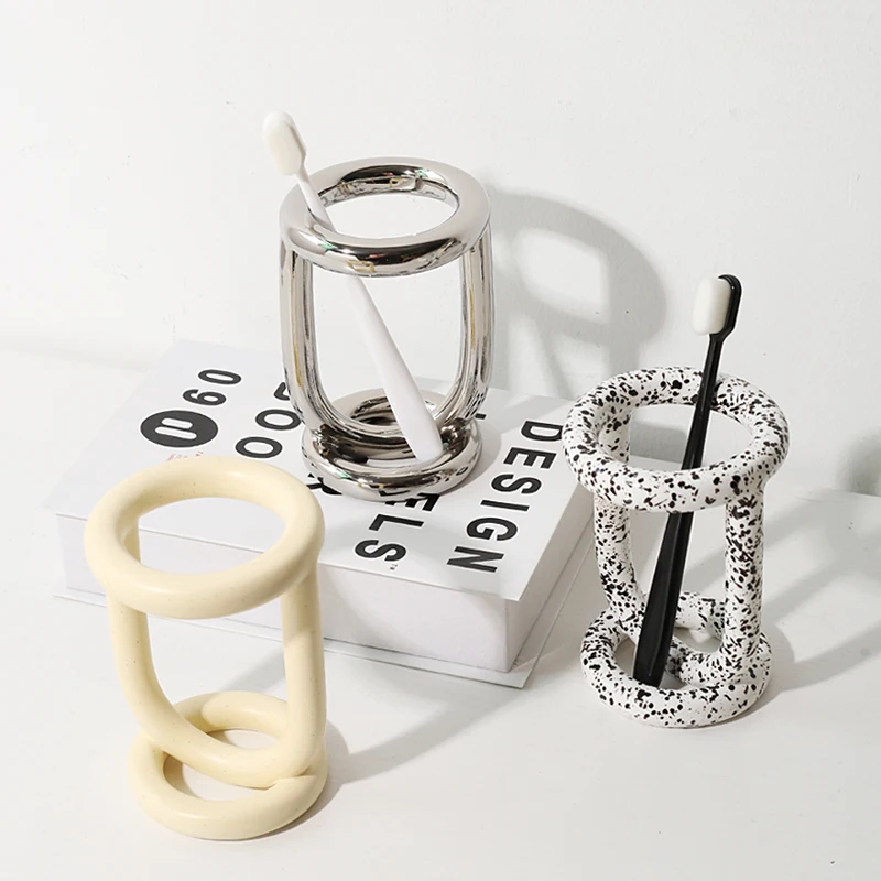Light luxury toothbrush rack shelf couple mouthwash cup household toothware toothpaste storage
Light luxury toothbrush rack shelf couple mouthwash cup household toothware toothpaste storage