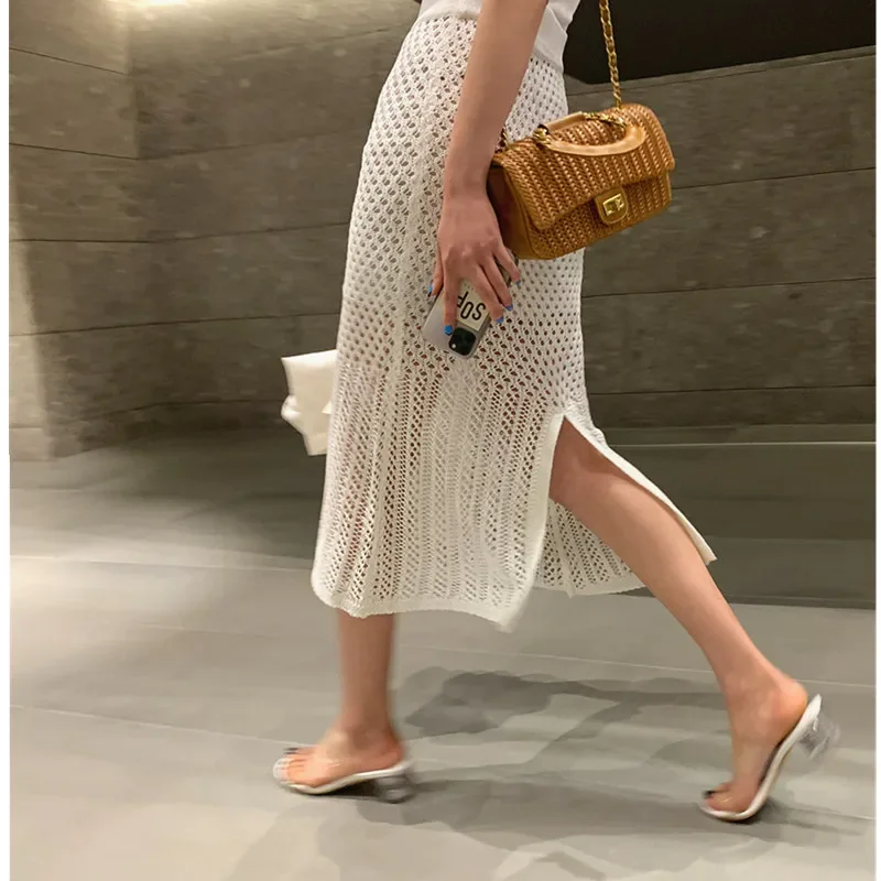 2021 New Summer Elegant Ladies Knitting Slim Bodycon Skirts Women Hollow Out Elastic High Waist Sexy Split Long Skirt White
2021 New Summer Elegant Ladies Knitting Slim Bodycon Skirts Women Hollow Out Elastic High Waist Sexy Split Long Skirt White