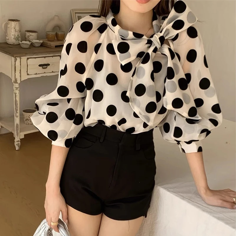 

Clothland Women Elegant Polka Dot Blouse See Through Bow Tie Collar Long Sleeve Shirt Retro Tops Blusa Mujer LB094