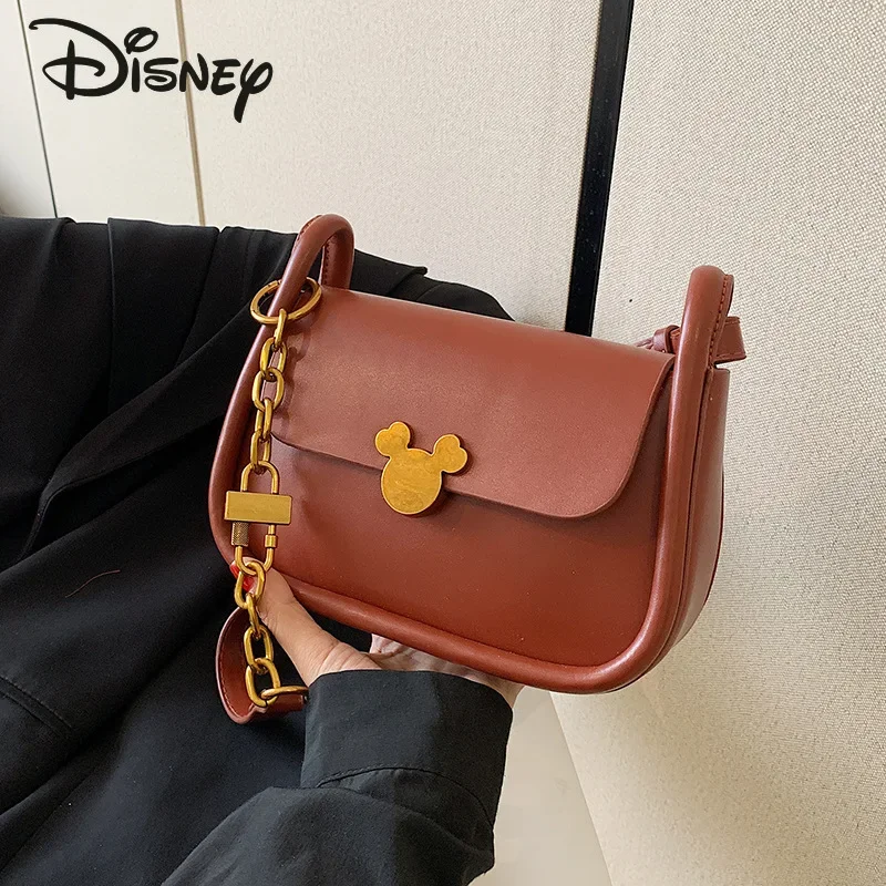 Новая женская сумка через плечо Disney с Микки, модная Высококачественная женская сумка через плечо, однотонная продвинутая женская сумка для подмышек
Новая женская сумка через плечо Disney с Микки, модная Высококачественная женская сумка через плечо, однотонная продвинутая женская сумка для подмышек