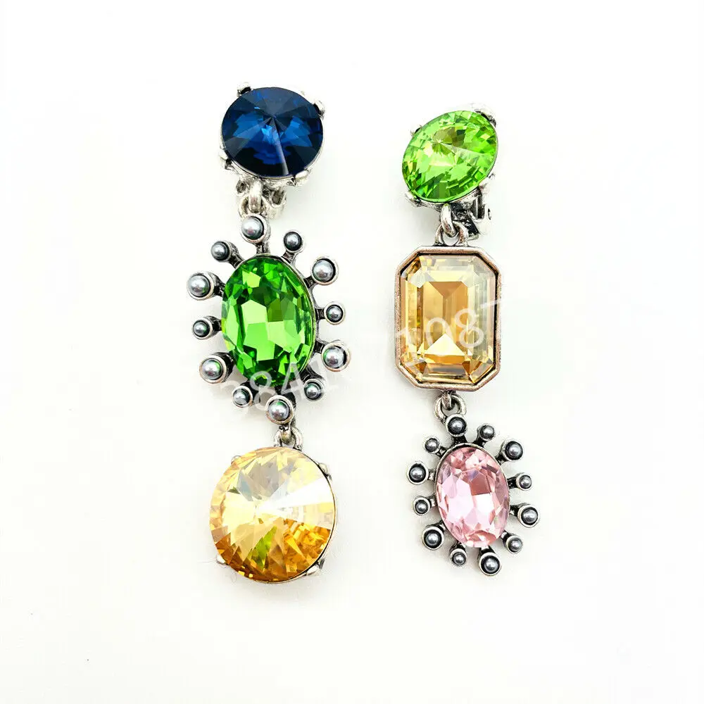 Oscar De La Renta Green & champagne pink Crystal Zircon Clip Earrings
Oscar De La Renta Green & champagne pink Crystal Zircon Clip Earrings