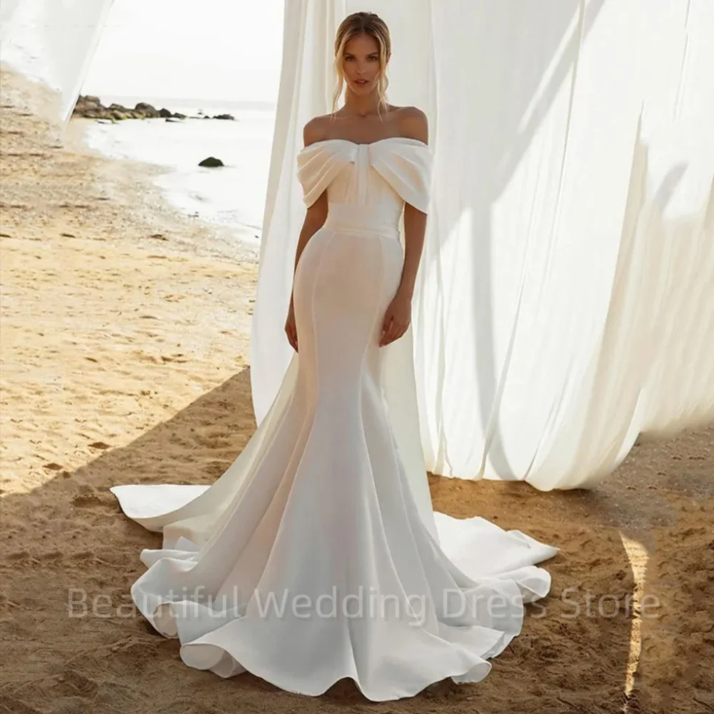 Женское атласное платье-русалка без рукавов, элегантное мягкое простое свадебное платье с открытыми плечами, платье невесты
Женское атласное платье-русалка без рукавов, элегантное мягкое простое свадебное платье с открытыми плечами, платье невесты