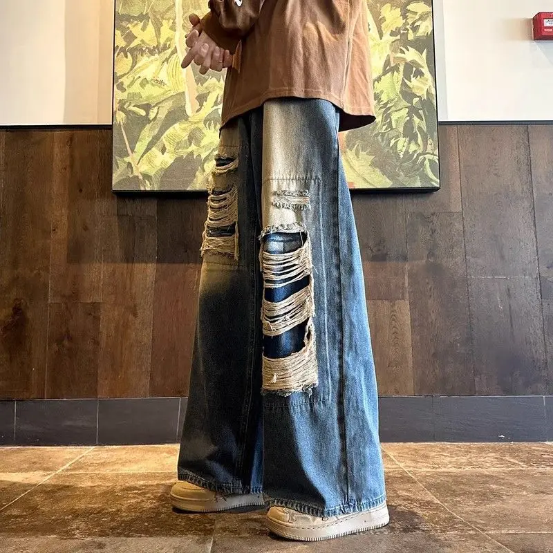Korean style floor-length raw edge ripped jeans men's autumn high street retro loose straight high waist drapey wide leg pants
Korean style floor-length raw edge ripped jeans men's autumn high street retro loose straight high waist drapey wide leg pants