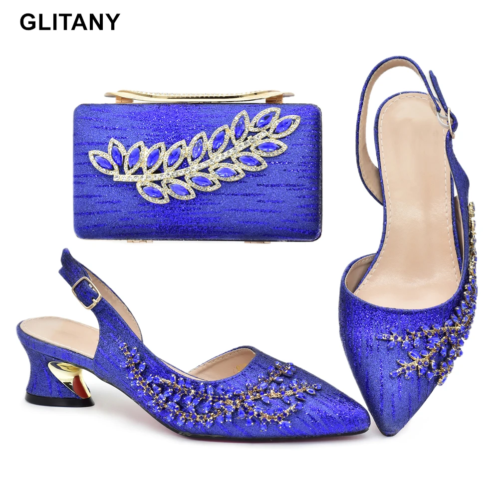 Latest Shoes and Bags Set for Women 2023 Italian Shoe and Bag Set Designer African Women Wedding Shoes Decorated with Rhinestone
Latest Shoes and Bags Set for Women 2023 Italian Shoe and Bag Set Designer African Women Wedding Shoes Decorated with Rhinestone
