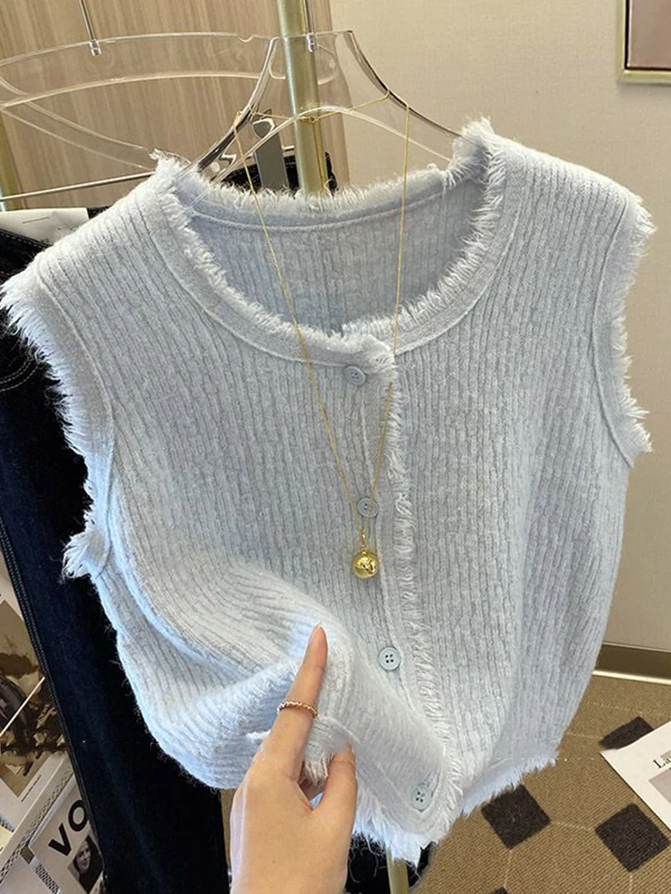Vintage Tassels Lady Knitwear Cropped Sweater Vest Women Korean Style O Neck Cardigan Solid Knitted Sleeveless Jumper Female
Vintage Tassels Lady Knitwear Cropped Sweater Vest Women Korean Style O Neck Cardigan Solid Knitted Sleeveless Jumper Female