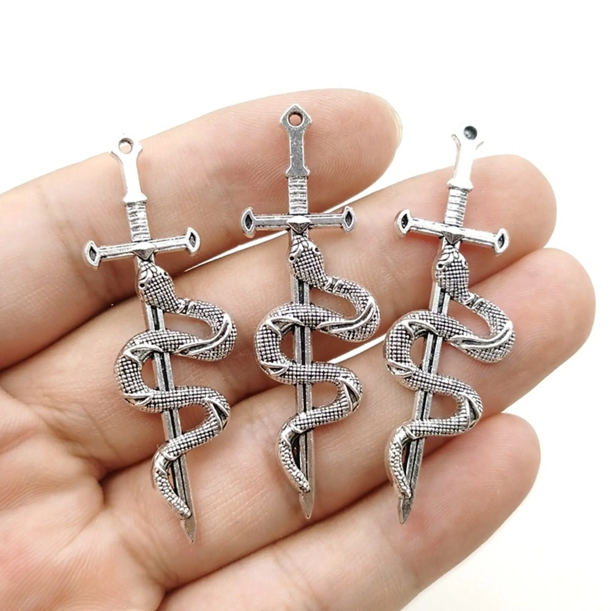 20pcs/lot 54x18mm new fashion vintage snake and sword small pendant accessories diy snake sword alloy accessories
20pcs/lot 54x18mm new fashion vintage snake and sword small pendant accessories diy snake sword alloy accessories
