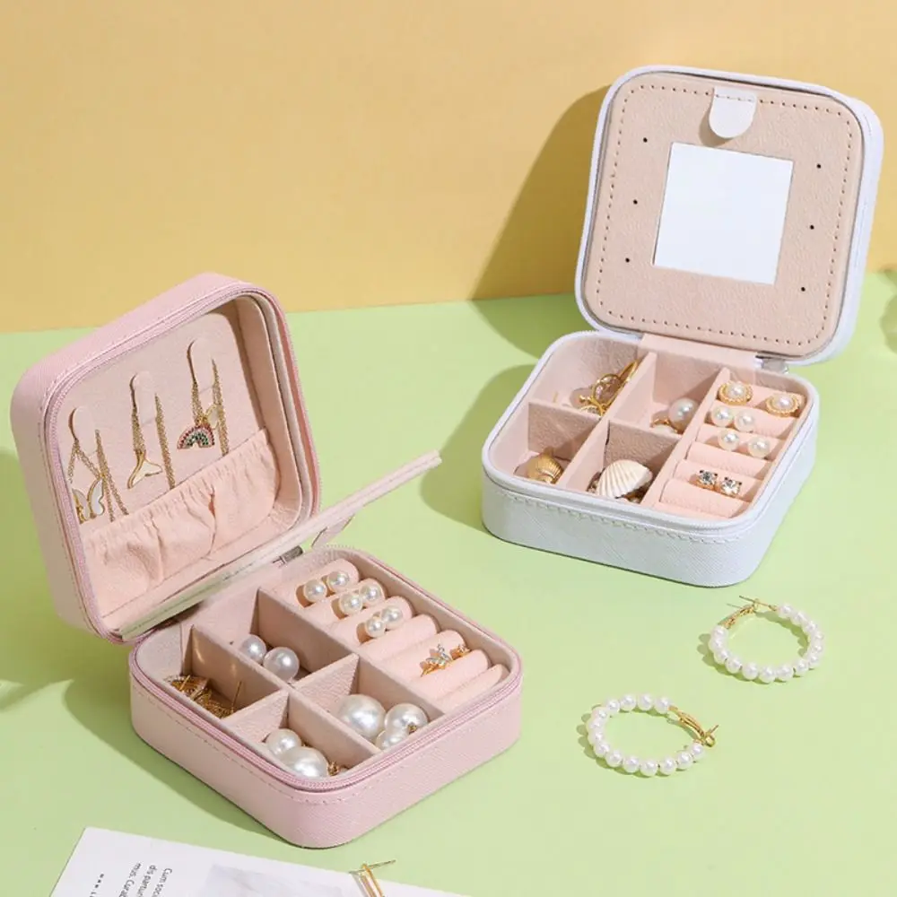 Шкатулка-органайзер для ювелирных изделий со съемной сеткой и зеркалом
Шкатулка-органайзер для ювелирных изделий со съемной сеткой и зеркалом