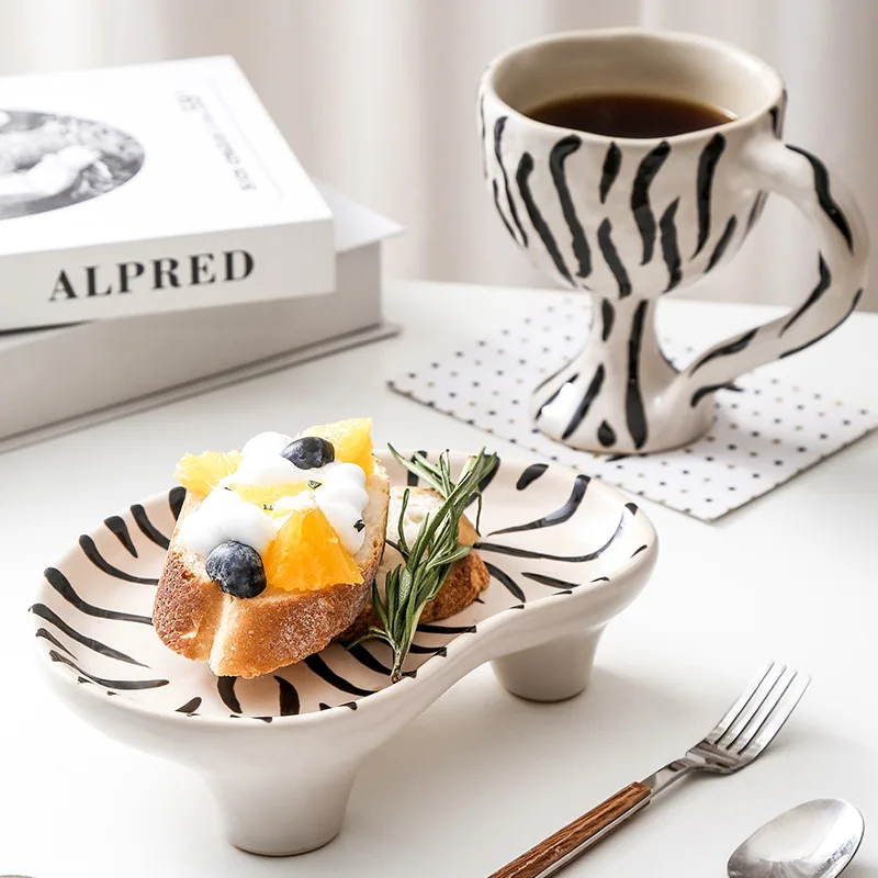 Oval Dessert Bread Plates Black Zebra Pattern Ceramic Plate Vintage Creative Cake Tray Western Food Plate Mug
Oval Dessert Bread Plates Black Zebra Pattern Ceramic Plate Vintage Creative Cake Tray Western Food Plate Mug