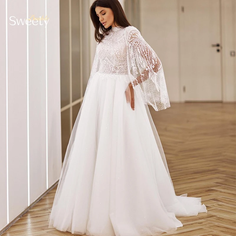 Luxurious A-Line Floor Length Wedding Dress Tulle With Beading Lace Ball Gown High-Neck Shawlfull Sleeve Bride Dress Back Button
Luxurious A-Line Floor Length Wedding Dress Tulle With Beading Lace Ball Gown High-Neck Shawlfull Sleeve Bride Dress Back Button