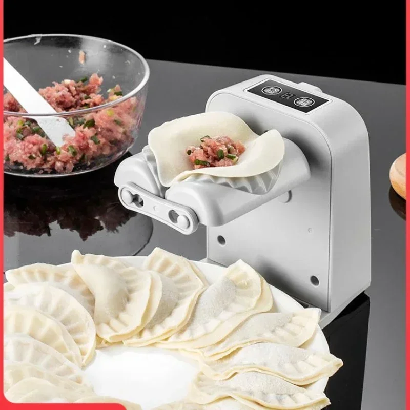 automatic dumpling wrapping machine for Home electric small dumpling wrapping machine tool for lazy people to wrap dumplings
automatic dumpling wrapping machine for Home electric small dumpling wrapping machine tool for lazy people to wrap dumplings
