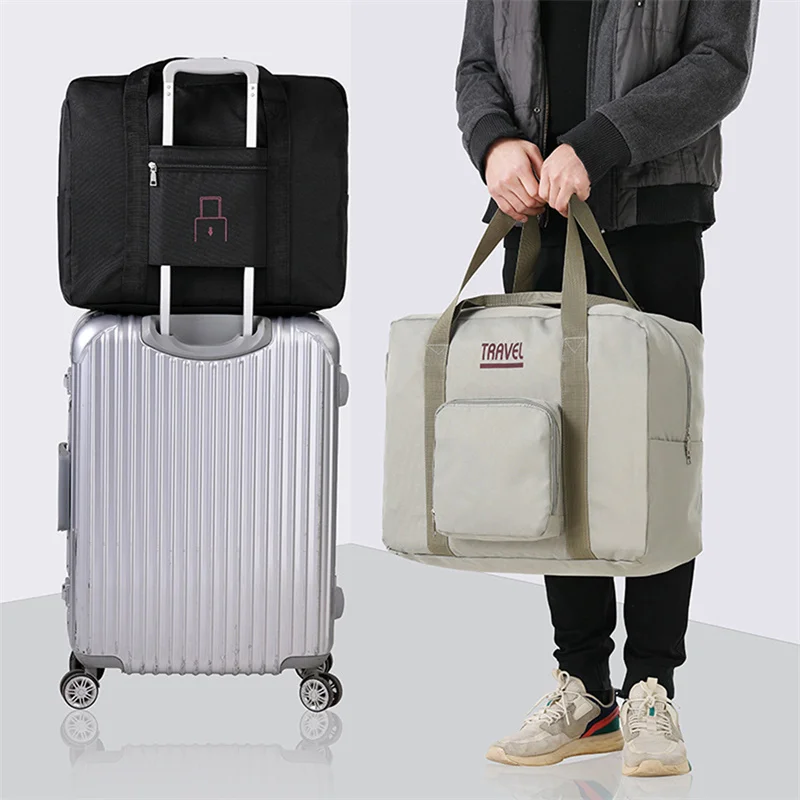 Unisex Foldable Travel Bags Outdoor Oxford Fabric Luggage Storage Bag Large Capacity Handbags Portable Clothing Storage Bags 
Unisex Foldable Travel Bags Outdoor Oxford Fabric Luggage Storage Bag Large Capacity Handbags Portable Clothing Storage Bags