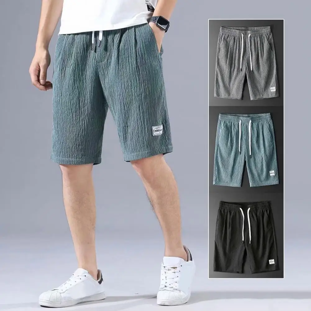 Шорты мужские спортивные с эластичным поясом, однотонные тонкие быстросохнущие Шелковые штаны для бега с карманами и широкими штанинами, лето
Шорты мужские спортивные с эластичным поясом, однотонные тонкие быстросохнущие Шелковые штаны для бега с карманами и широкими штанинами, лето