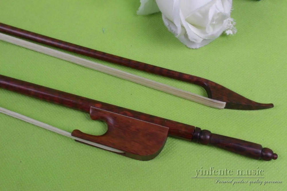 Yinfente Snake Wood Violin Bow 4/4 Baroque Style Snake wood Frog Violin Accessory Parts Natural White Horse Hair Full Size 
Yinfente Snake Wood Violin Bow 4/4 Baroque Style Snake wood Frog Violin Accessory Parts Natural White Horse Hair Full Size