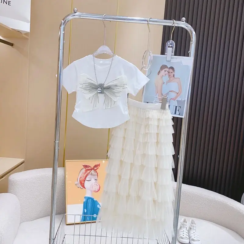 Retail 2023 New Baby Girls Teenage Summer Fashion Sets, Bow T-shirt + Mesh Cake Skirts 2-9 T
Retail 2023 New Baby Girls Teenage Summer Fashion Sets, Bow T-shirt + Mesh Cake Skirts 2-9 T