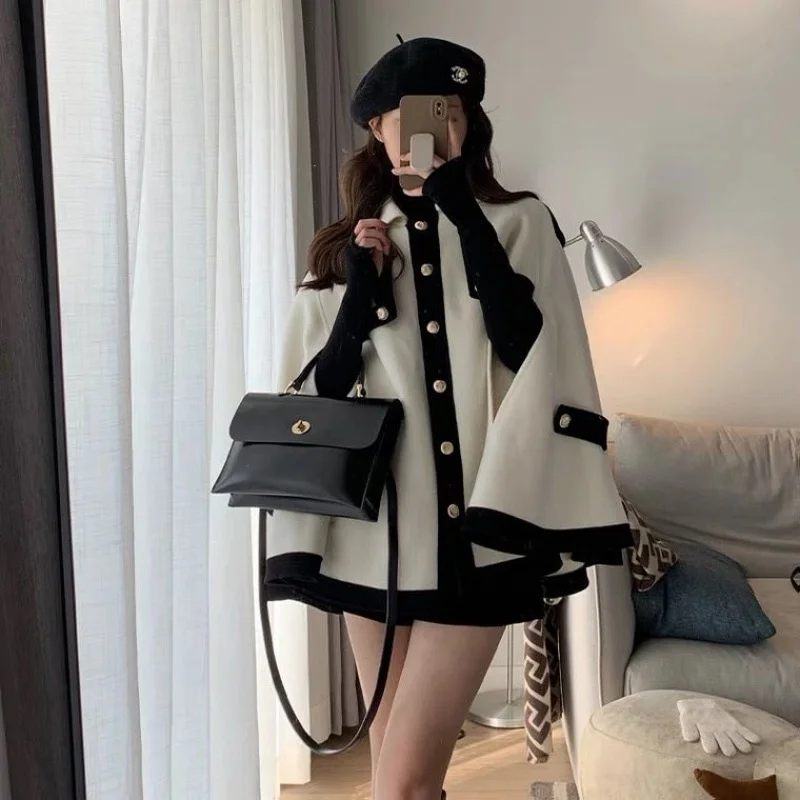 French Cloak Coat Women's Spring And Autumn 2022 New Hepburn High Grade Loose Cashmere Small Fragrant Winter Short Coat
French Cloak Coat Women's Spring And Autumn 2022 New Hepburn High Grade Loose Cashmere Small Fragrant Winter Short Coat
