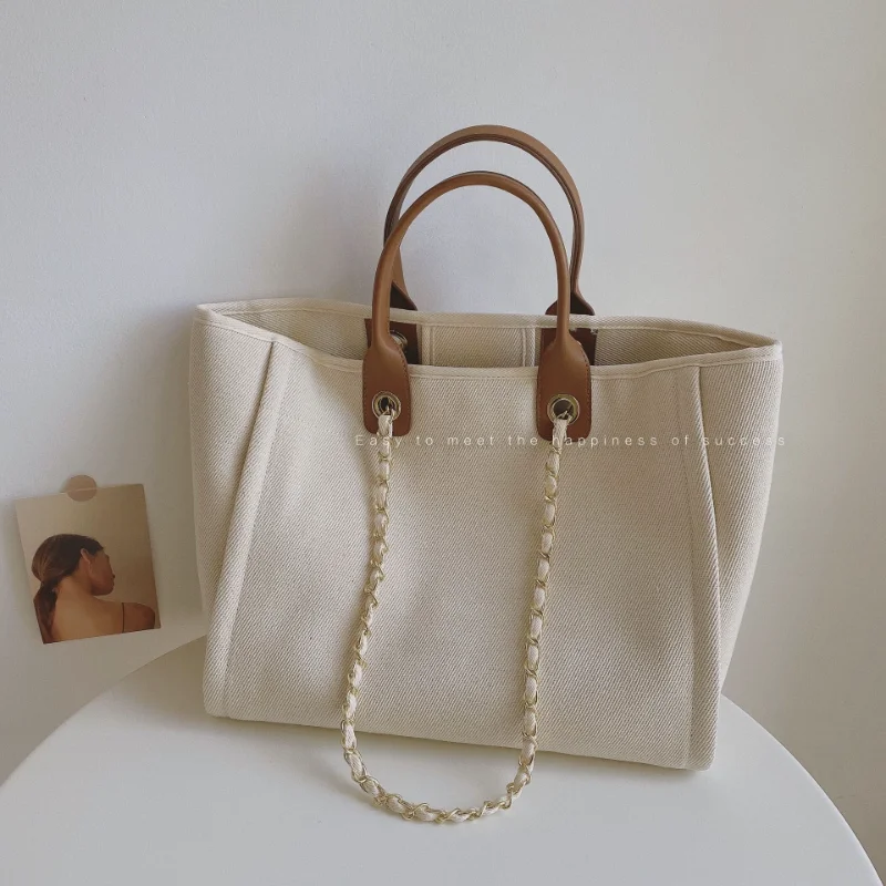 2023 New Shoulder Bag Canvas Bag Korean-style Portable Large Capacity Chain Tote Bag Fashionable All-match Simple Style Handbags
2023 New Shoulder Bag Canvas Bag Korean-style Portable Large Capacity Chain Tote Bag Fashionable All-match Simple Style Handbags