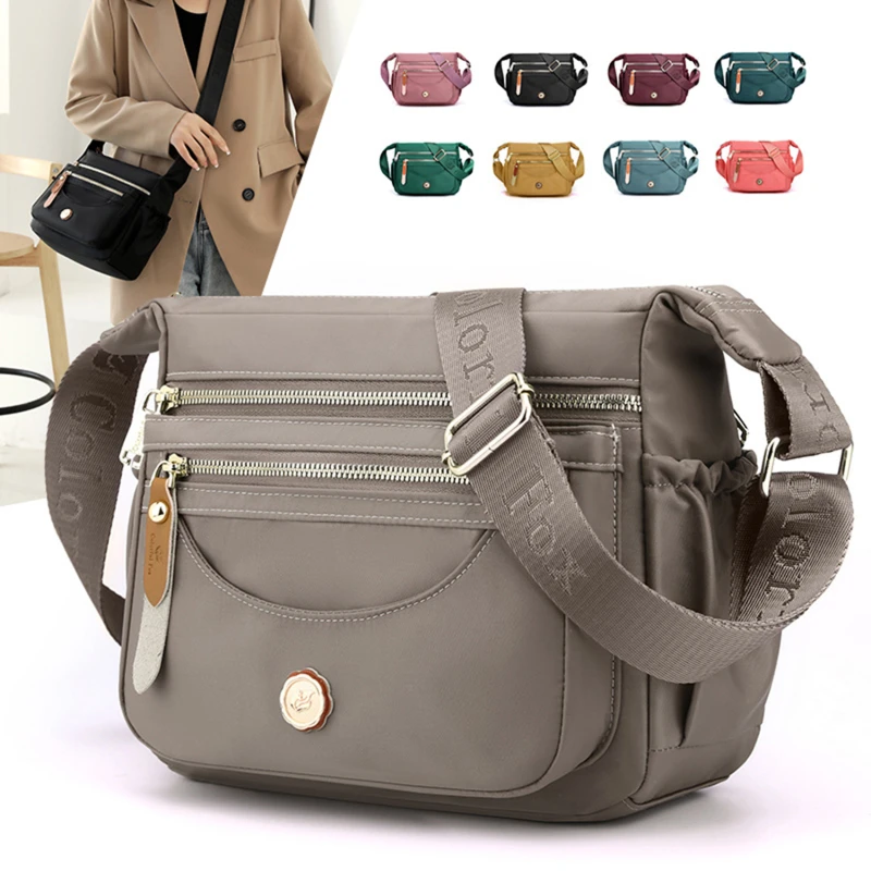 New Female Nylon Bag Casual Shoulder Bag Multi-layered Phone Bag Multi-pocket Shoulder Bag Solid Color Ladies Crossbody Bag
New Female Nylon Bag Casual Shoulder Bag Multi-layered Phone Bag Multi-pocket Shoulder Bag Solid Color Ladies Crossbody Bag