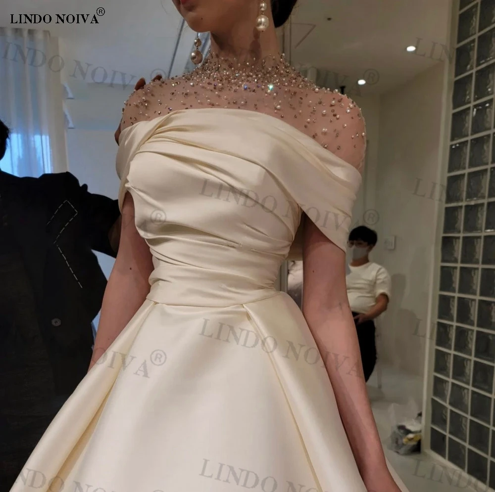 LINDO NOIVA Off the Shoulder Wedding Dresses for Bride A-Line Wedding Gowns for Women 2023 Bride Pearls robe de mariée sirène
LINDO NOIVA Off the Shoulder Wedding Dresses for Bride A-Line Wedding Gowns for Women 2023 Bride Pearls robe de mariée sirène