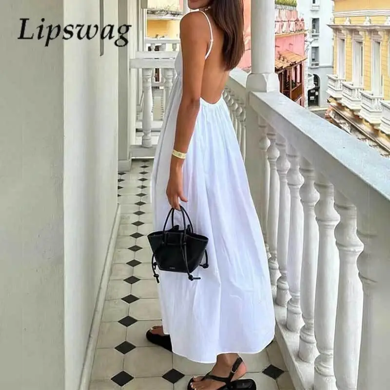 Sexy V-Neck Versatile Bohemian Long Dress Ladies Spring Solid Loose Folds Party Dress Summer Simple Halter Hollow Strap Dress
Sexy V-Neck Versatile Bohemian Long Dress Ladies Spring Solid Loose Folds Party Dress Summer Simple Halter Hollow Strap Dress