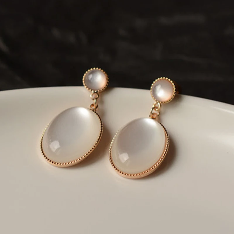 Korea New White Moonlight Cat's Eye Stone Earrings For Women Small Fresh Geometric Eardrop Elegant Ladies Temperament Jewelry 2 Mallzona S7ac10e6524a74f1d98a5fb1cfab62ed5o Korea New White Moonlight Cat's Eye Stone Earrings For Women Small Fresh Geometric Eardrop Elegant Ladies Temperament Jewelry Mallzona