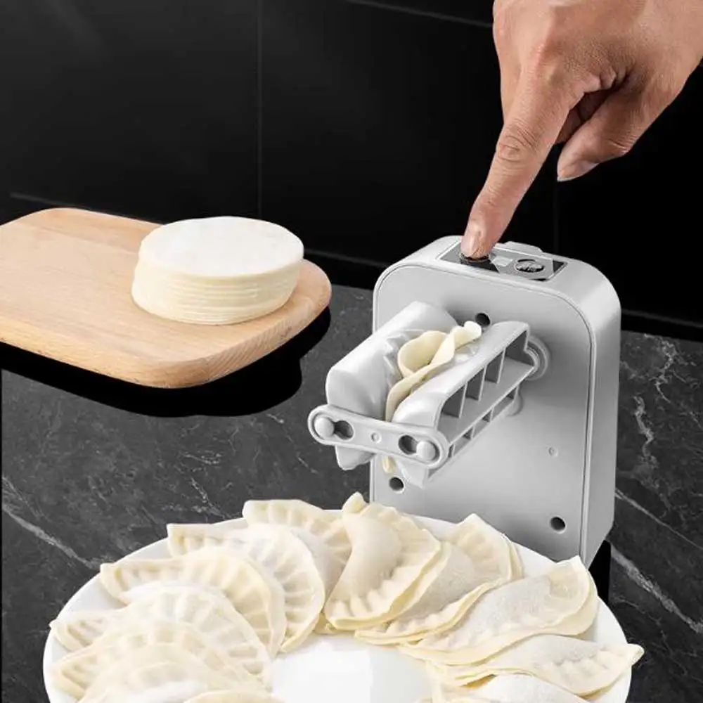 Fully Automatic Wireless Dumpling Maker Electric Dumpling Making Machine Small Food Processors Press Integrated Machine
Fully Automatic Wireless Dumpling Maker Electric Dumpling Making Machine Small Food Processors Press Integrated Machine