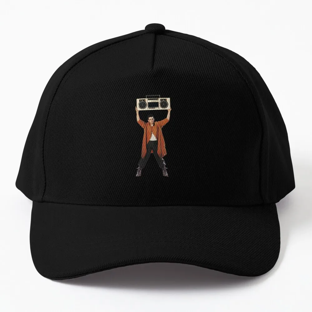 SAY ANYTHING John Cusack holds up a boombox boom box Lloyd Dobler and Diane Court Ione Skye Peter Gabriel In Your E Baseball Cap
SAY ANYTHING John Cusack holds up a boombox boom box Lloyd Dobler and Diane Court Ione Skye Peter Gabriel In Your E Baseball Cap