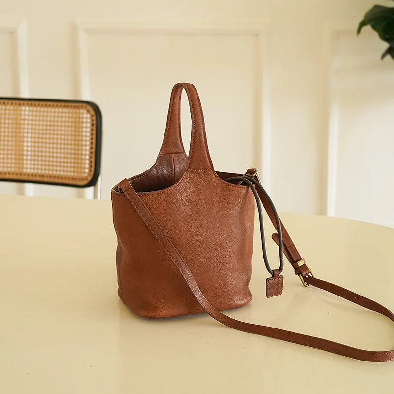 Genuine leather women's bag, new handbag, large capacity bucket bag, high-end vegetable basket bag
Genuine leather women's bag, new handbag, large capacity bucket bag, high-end vegetable basket bag