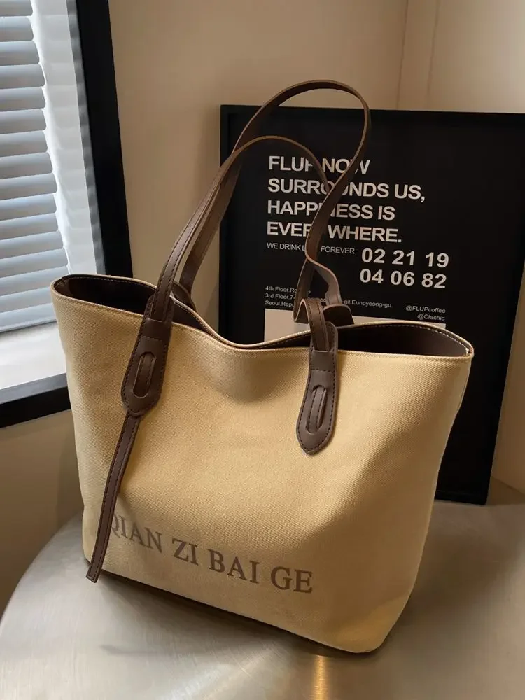 Large Capacity Bag Women's New Autumn/Winter Fashion Commuter Shoulder Bag Simple and Casual Versatile Canvas Tote Bag
Large Capacity Bag Women's New Autumn/Winter Fashion Commuter Shoulder Bag Simple and Casual Versatile Canvas Tote Bag