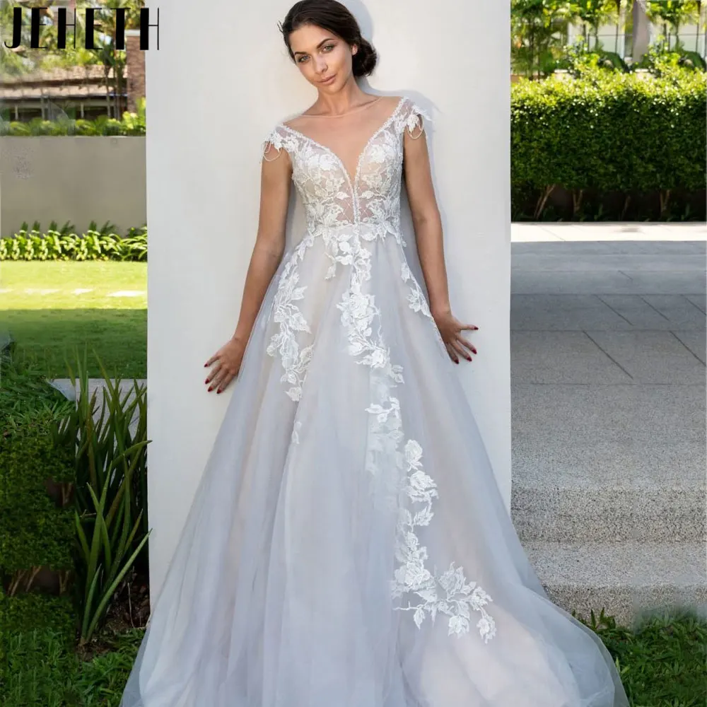 JEHETH Sexy Sleeveless Backless Wedding Dress Classic Appliques A-Line Bride Gown Back Button Tulle свадебное платье Custom Made
JEHETH Sexy Sleeveless Backless Wedding Dress Classic Appliques A-Line Bride Gown Back Button Tulle свадебное платье Custom Made