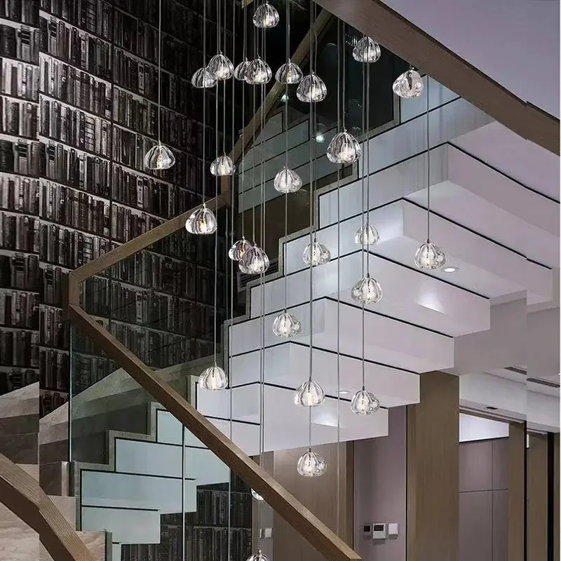 Modern K9 crystal ball chandelier is used in villa hotel lobby living room restaurant duplex staircase lounge long hanging lamp
Modern K9 crystal ball chandelier is used in villa hotel lobby living room restaurant duplex staircase lounge long hanging lamp