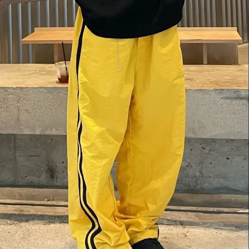Korean Y2K Streetwear Yellow Track Pants Women Harajuku Hip Hop Wide Leg Sweatpants Oversize Quick Dry Striped Joggers Trousers
Korean Y2K Streetwear Yellow Track Pants Women Harajuku Hip Hop Wide Leg Sweatpants Oversize Quick Dry Striped Joggers Trousers
