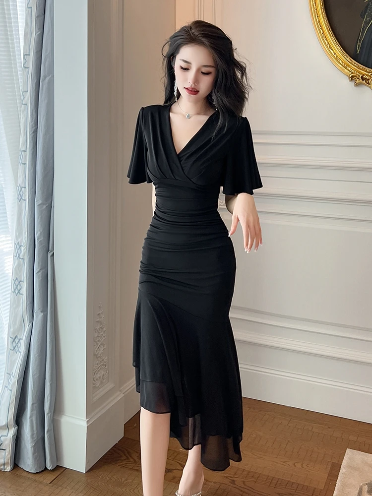 

French Hepburn style black V-neck goddess style dress, women's summer temperament, socialite irregular long skirt